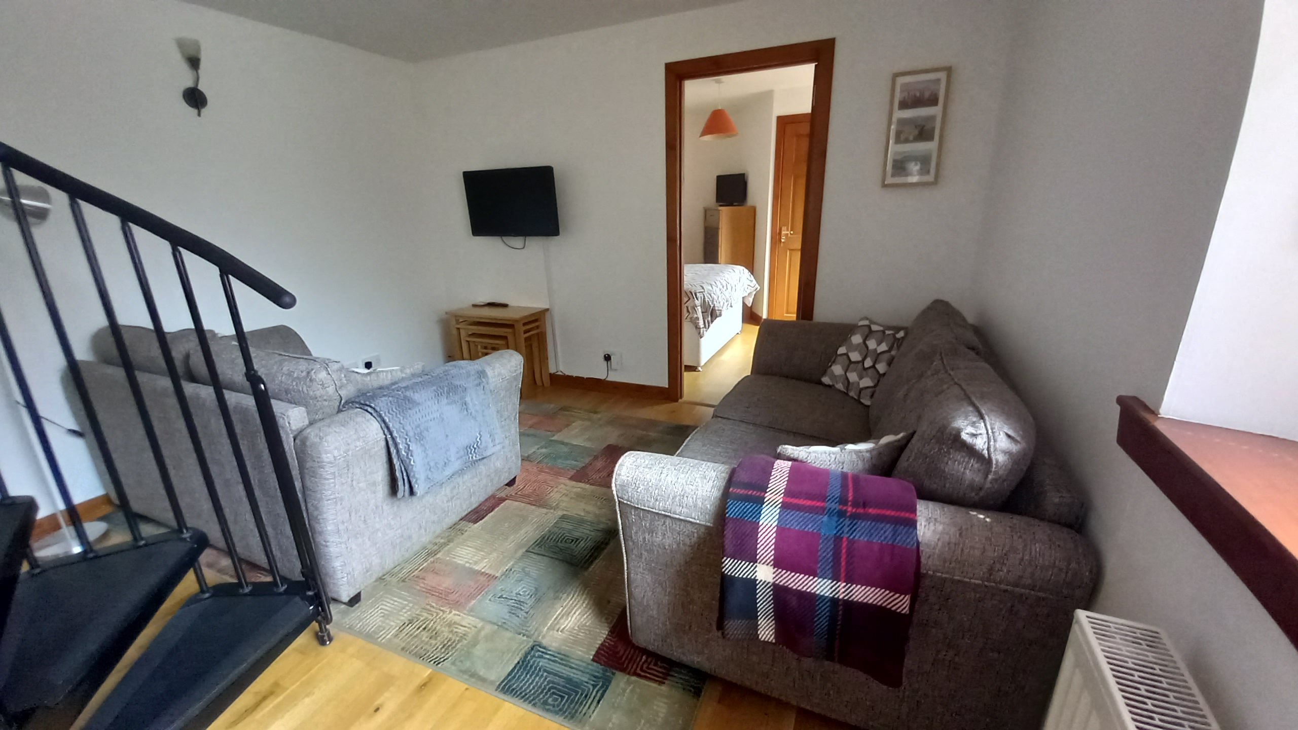 Living area through to double bedroom